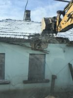 Экскаватор-погрузчик в работе, Симферополь
